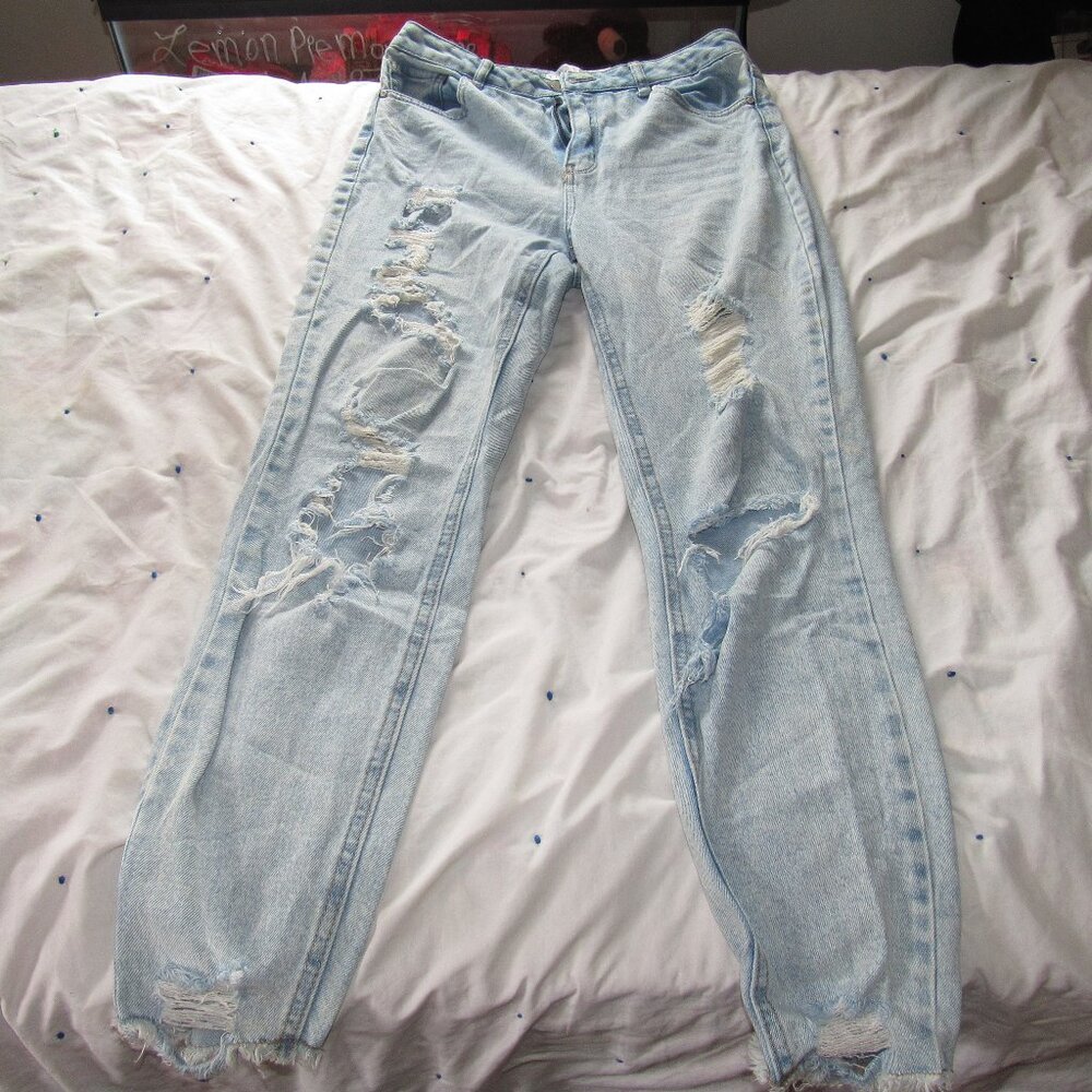 Super Light Blue Jeans with Rips